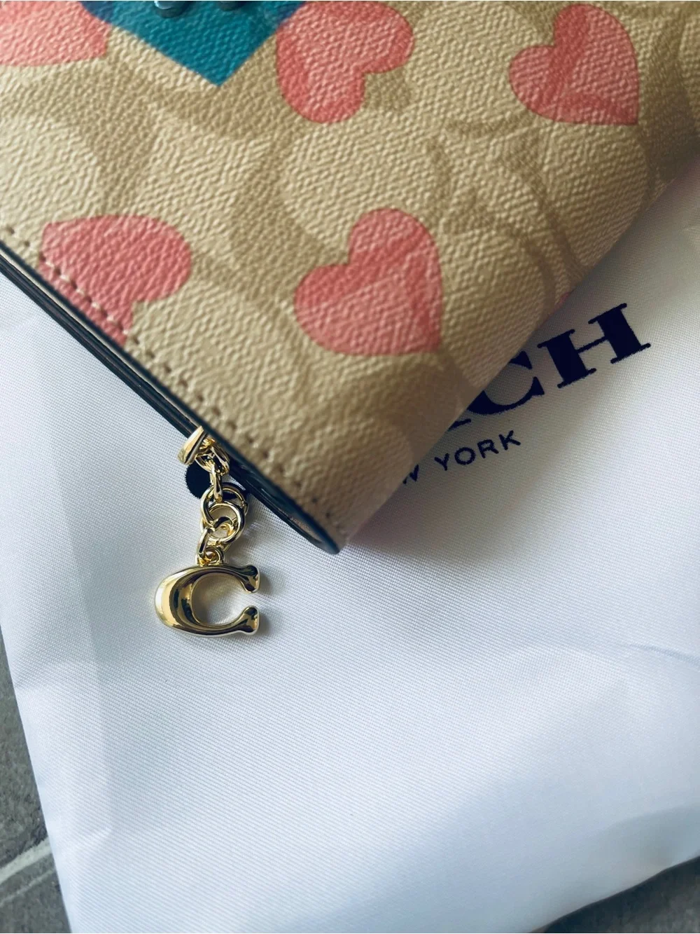 New Coach Beige Canvas Small Wallet with Pink Heart Print .